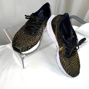 Black and gold nike zoom pegasus